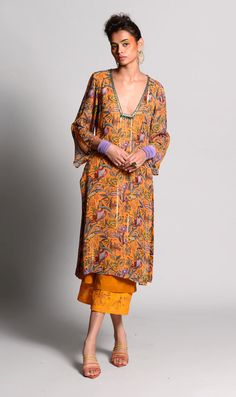 Rishi & Vibhuti | Ochre Printed Kurta Set | INDIASPOPUP.COM Layered Pants, Layered Tunic, Long Kurta, Embroidered Crop Tops, Crop Top Set, Embroidered Neckline, Indian Fashion Designers, Kurta With Pants, Embroidered Tunic