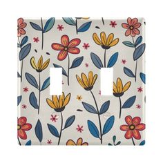 a light switch cover with colorful flowers on it