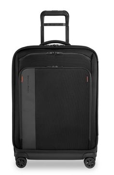 This spinner suitcase is made of durable ballistic nylon with plenty of organization, a zip expander and reinforced corner guards for more stability. A telescopic handle and 360-degree navigation let you breeze through the terminal while compression straps and mesh compartments keep your clothing and toiletries neat and secure. Two-way zip-around closure Top telescopic handle; top and side carry handles Exterior zip pockets Interior mesh zip pocket; zip pockets; zip divider; compression straps L Modern Nylon Luggage For Business, Functional Black Luggage For Formal Occasions, Black Travel Cases With Luggage Sleeve, Black Rectangular Cases With Luggage Sleeve, Multifunctional Black Luggage With Sleeve, Practical Black Luggage With Functional Pockets, Womens Luggage, Spinner Suitcase, Functional Black Luggage With Anti-theft Pocket