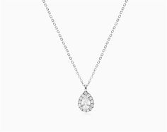 18K White Gold Halo Pear Shape Diamond Necklace. Upgrade your diamond solitaire pendant with this exquisite pear halo necklace. A classic look that will last a lifetime. Pendant Dimensions: 9x6mm aka Diamond Necklaces Pear Shaped Diamond Necklace, Pear Halo, Diamond Solitaire Pendant, Halo Necklace, Diamond Necklaces, Gold Halo, Solitaire Pendant, Pear Shaped Diamond, Engagement Ring Styles