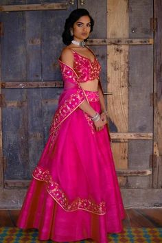 Shop for Shikha Mehta Fuchsia Blouse Raw Silk Lehenga Set for Women Online at Aza Fashions Pink Choli With Gota Work In Tissue Silk, Pink Tissue Silk Choli With Gota Work, Pink Slub Silk Lehenga For Festivals, Pink Slub Silk Lehenga With Cutdana, Pink Slub Silk Lehenga With Zari Work, Pink Slub Silk Lehenga For Diwali, Pink Blouse Piece In Tissue Silk With Gota Work, Designer Pink Slub Silk Lehenga, Pink Slub Silk Dupatta For Party