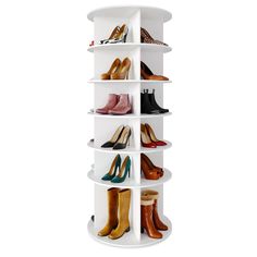 a white shelving unit with several pairs of shoes on top and bottom shelves in the middle