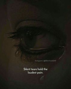 a woman's eye with the caption silent tears hold the loudest pain