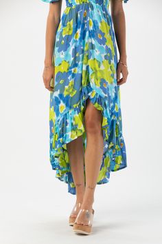 Born in the Borough that embodies the rhythm and soul of New York city, the Brooklyn Dress’ edge and grace has become a Tiare Hawaii staple. Perfect for beach getaways to nights out on the town, we love its effortless versatility and elegance. You’ll adore flowing with each step and accessorizing to your mood. Details: 100% Rayon Hand Wash & Lay flat to dry Features: Off the shoulder ruffle sleeve, Smocked sweetheart bodice, Elasticized neckline and waist, High-low ruffled hem Measures: Approxim Blue Spring Maxi Dress For Poolside, Blue Maxi Dress For Poolside Spring, Blue Maxi Dress For Spring Poolside, Spring Poolside Breezy Maxi Dress, Spring Breezy Poolside Maxi Dress, Spring Breezy Maxi Dress For Poolside, Blue Beach Dress For Poolside Spring, Spring Beachwear Maxi Dress With Flowy Skirt, Blue Flowy Maxi Dress For Vacation