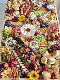 a table covered in lots of different types of food