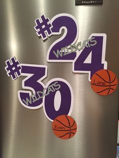 a refrigerator with numbers and basketballs on it