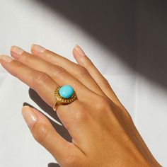 Our Sleeping Beauty Turquoise Celestial Cocktail Ring is back in Stock and available in size 7. From Elizabeth Moore's Signature Celestial Collection created in recycled 18K Yellow Gold in the heart of New York's Diamond District. Diam: 12.80 x 17 Sleeping Beauty Turquoise from AZ Handcrafted in New York City To find your perfect fit, check out our complementary Ring Sizer. Handmade Yellow Gold Turquoise Ring, Handmade Turquoise Ring In Yellow Gold, Celestial Style Cabochon Yellow Gold Rings, Celestial Yellow Gold Cabochon Rings, Luxury Turquoise Cabochon Ring, Heirloom Gold Turquoise Gemstone Ring, Fine Jewelry Turquoise Ring In Yellow Gold As Gift, Fine Jewelry Turquoise Ring, Luxury Gold Turquoise Ring