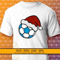 a t - shirt with a soccer ball wearing a santa claus hat on the front