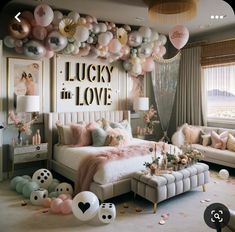 a bedroom decorated in pink, white and gold with balloons all over the room that says lucky in love