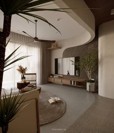 a living room filled with furniture next to a tall plant in front of a flat screen tv