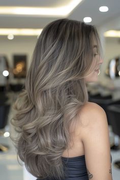 Achieve a chic and elegant look with ash brown balayage, a sophisticated hair trend that effortlessly enhances your style. This technique beautifully merges the refined charm of ash tones with a touch of natural radiance, resulting in a stunning and versatile transformation. Embrace the best of both worlds with this subtle yet impactful hair color choice that is sure to elevate your overall aesthetic. Gray Brown Blonde Hair, Ashy Hair Color Ash Brown, Gray Ash Blonde Hair, Gradient Hair Dye, Haircolor Trending 2024, Coquette Hair Color, Hair Color Ideas Cool Tones, Brunette To Ash Blonde, One Hair Color Ideas