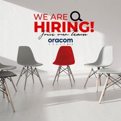 a group of chairs sitting in front of a wall with the words we are hiring on it