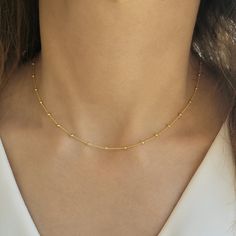 ✔️A Lovely necklace for a stunning look✔️ This satellite choker is great for wearing alone or for layering with other necklaces. It is the perfect gift for your girlfriend, sister, bridesmaids, or even yourself! >>IS IT A GIFT? This minimalist necklace comes in a beautiful gift package. If you wish to send a personal message, please make a comment at the checkout process! >>SIZE This beaded chain choker is available in length of 12, 13, 14, 15 , 16, 17, 18, 19 , 20 inches (30-33- 35- Minimalist Gold Choker With Satellite Chain, Trendy Gold Beaded Chain Choker, Gold Beaded Choker Necklace With Clavicle Chain, Gold Beaded Clavicle Chain Choker, Gold Choker With Satellite Chain, Gold Beaded Clavicle Choker Necklace, Gift Layered Choker Necklace With Beaded Chain, Gift Beaded Chain Layered Choker Necklace, Beaded Chain Layered Choker Necklace As Gift