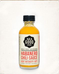 a bottle of habanero chili sauce on a white background