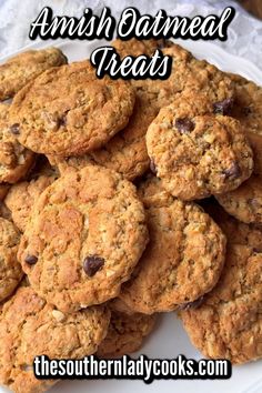 a white plate topped with cookies on top of a table