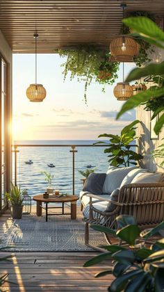 an outdoor living area with wicker furniture and plants on the deck overlooking the ocean