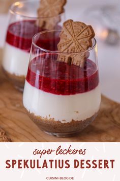 two glasses filled with dessert on top of a wooden cutting board and text overlay