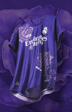 an image of a soccer jersey hanging on a purple rose flower background with the name emirates's player printed on it