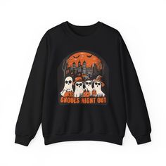 Celebrate your love for Halloween with our "Ghouls Night Out" sweatshirt! This trendy design showcases a group of chic, sunglasses-wearing ghosts ready to take on the night in a spooky cityscape. It's the ideal sweatshirt for those who enjoy a little style with their scares, making it perfect for Halloween parties, gatherings, or simply a night out with your own ghoul squad. Key Features: Comfortable & Warm: Crafted from a soft blend of cotton and polyester, this sweatshirt is perfect for keepin Spooky Graphic Print Sweatshirt For Streetwear, Halloween Band Merch Sweatshirt With Graphic Print, Ghouls Night, Halloween Chic, Halloween Mode, City Backdrop, Chic Halloween, Chic Sunglasses, Ghost Design