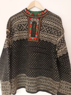 "Vintage mens Norwegian knit sweater fair Isle black and white pullover with embroidered and lined neckline and metal hook closure.Shoulder to shoulder:24\"Length:26\" Arms:23\".100%wool,handknit   It is in very good condition!" Bohemian Tops With Fair Isle Pattern For Winter, Bohemian Winter Tops With Fair Isle Pattern, Winter Bohemian Tops With Fair Isle Pattern, Bohemian Fair Isle Pattern Tops For Winter, Nordic Black Sweater With Fair Isle Pattern, Black Nordic Jacquard Knit Sweater, Traditional Long Sleeve Winter Tops, Traditional Long Sleeve Tops For Winter, Black Wool Sweater With Fair Isle Pattern