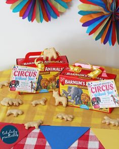 three bags of circus biscuits on a table