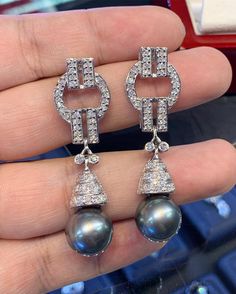 We are presenting you a HUGE pair of Art Deco, CHANDELIER, Genuine, LUSTROUS GRAY TAHITIAN, South Sea Pearls, extremely FINE AA+, LUSTROUS and Rare! Accenting the 2 pearls are 102 pieces of E/VS Natural diamonds, weighting a total of 1.65 carats. Set in GORGEOUSLY designed 18K solid white gold Art Deco earrings! PERFECT FOR SPECIAL OCCASIONS! SO BIG AND GORGEOUS! EVERYONE WILL FALL IN LOVE WITH THEM THE MINUTE THEY SEE YOU WEARING THEM! ONLY ONE ITEM AVAILABLE!! NO DUPLICATES!! WHAT YOU SEE IN T Luxury Tahitian Pearl Wedding Earrings, Luxury Black Tahitian Pearl Earrings, Tahiti Wedding, Gold Art Deco Earrings, Deco Chandelier, Earrings Chandelier, Deco Earrings, Art Deco Chandelier, Gold Art Deco