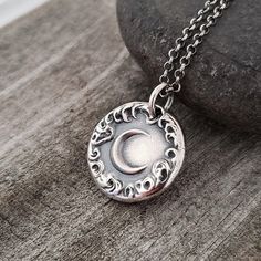 "This sterling silver charm is featured with the crescent (new moon) surrounded by thick cloud which represents the moon that lights the night sky for travelers. It is also a symbol of the hope of greater glory. Talk to the moon. Tell the Universe exactly what you want. Your dream will come true! >>Size: 21 mm (see reference to the dime) >>Material: 925 Sterling silver Each piece is is designed to inspire the wearer and made by our own hands. The wax seal is originally created at our studio with Talk To The Moon, Seal Necklace, Wax Seal Necklace, Silver Items, Men Jewelry, Silver Work, The Hope, Wax Seal, Moon Pendant