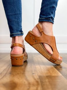 True to size fit. If you are a 1/2 size, size up. Faux Leather Faux leather upper 1-inch wedge, 1-inch platform height Hook-and-loop adjustable slingback strap closure Wedge Sandals, Cognac, 1 Inch, Leather Upper, Wedges, Faux Leather, Thing 1, Sandals, Leather