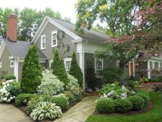 a house with landscaping in the front yard