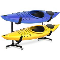 two kayaks are sitting next to each other on a stand with one blue and the other yellow