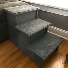 a set of stairs leading up to a couch