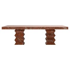 a brown marble table with three legs and an intricate design on the top, against a white background