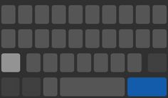 an image of a computer keyboard with blue and gray squares on it's side