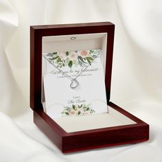 Will you be my bridesmaid - I couldn't say I DO with out you!Imagine her delight when she sees this beautiful Delicate Heart Necklace, lovingly crafted in sterling silver and dipped in 14k white gold or 18k yellow gold for added luxury. This piece is pure elegance wrapped up in timeless simplicity. Trends may come and go, but this piece will last a lifetime with its classic subtle beauty.Product Specifications: .925 solid sterling silver dipped in 14k white gold or 18k yellow gold 0.5" (12mm) Ad Delicate Sterling Silver Wedding Jewelry Gift, Elegant Heart Charm Necklace For Wedding Gift, Elegant Jewelry For Valentine's Wedding Gift, Elegant Hallmark Jewelry For Wedding, White Gold Jewelry For Bridesmaid Gift, Elegant Jewelry For Wedding Gift On Valentine's Day, Elegant Sterling Silver Jewelry For Wedding And Valentine's Day, Elegant Jewelry With Hallmark For Wedding, Valentine's Day Wedding Gift Sterling Silver Jewelry