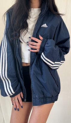 Sports Jacket Outfit Women Casual, Pretty Blue Outfits, Adidas Jacket Aesthetic, Rainy Day Festival Outfit, Black And Blue Outfit Aesthetic, Windbreaker Outfit Aesthetic, 90s Varsity Jacket Outfit, Navy Blue Clothes Aesthetic, Adidas 90s Outfit