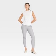 You'll never tire of dressing up or dressing down the High-Rise Skinny Ankle Pants from A New Day™ for versatile looks any day of the week. Crafted from cotton with spandex, these high-rise skinny pants will keep you comfy from day to night and season to season. The pull-on pants offer you a figure-flattering look, and they skim the ankles, letting you show off your stylish footwear. The pull-on pants are finished with a side hook and zipper for a secure fit with a sleek look. Wear them with any Mid-rise Capris For Workwear In Spring, Spring Mid-rise Stretch Dress Pants, Spring Workwear Mid-rise Capris, Spring Stretch Mid-rise Dress Pants, Mid-rise Capris For Business Casual In Spring, Spring Business Casual Tapered Leg Capris, Spring Business Casual Mid-rise Capris, First Order Ships, Stylish Footwear