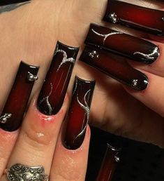 Black Goth Nails Square, Medium Goth Nails, Black And Red Nails For Prom, Dark Nail Sets, Long Alt Nails, Deep Red And Black Nails, Black Silver And Red Nails, Floral Black Nails, Arrow Nails Shape