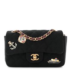 This is an authentic CHANEL Felt Quilted Paris-Hamburg Charms Mini Rectangular Flap in Black. This chic bag features quilted felt fabric in black with nautical charm embellishments. The bag features a long chain of red leather and an aged gold shoulder strap that can be worn cross-body. The flap opens with a detailed aged gold CC Chanel turn lock to a red leather interior with a zipper and patch pocket. Chic Bags, Felt Fabric, Long Chain, Leather Interior, Dark Navy, Dark Black, Red Leather, Patch Pocket, Cross Body