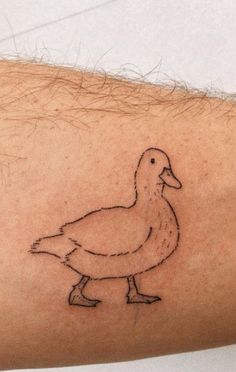 a drawing of a duck on the arm