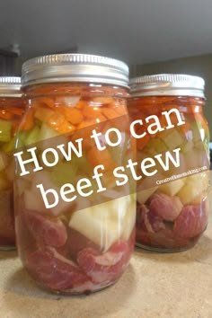 three jars filled with food sitting on top of a counter