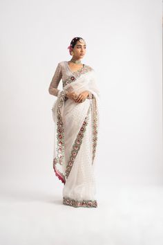 Multi-color v-neck hand embroidered blouse with sequins splash silk organza hand-cut mirror border saree.From Vvani Vats Rang's collection.DELIVERY TIMEPlease allow 8-12 weeks for your outfit to arrive.FABRIC DETAILSOrganza, GeorgetteProfessional cleaning only. Vani Vats, Off White Saree, Saree Organza, Mirror Border, Zipper Blouse, Border Saree, White Saree, Saree Border, Saree Fabric