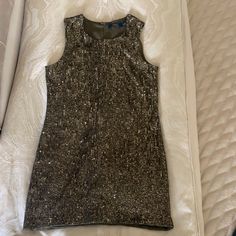 The Season's Olive Palette Takes A Glamorous Turn In This Hand-Sequined Shift Dress. - Sleeveless Shift Silhouette. - Us Size 10 Rounded Neckline. Concealed Center Back Zipper With A Hook-And-Eye Closure. - Hand-Applied Sequins Throughout. - Fully Lined. - Shell And Lining: 100% Polyester. - Spot Clean. - Imported From India Where You Find The Best Of Sequins. Gold Sleeveless Mini Dress With Contrast Sequin, Sleeveless Contrast Sequin Mini Dress For Holiday Party, Sleeveless Embellished Sequin Dress For Night Out, Sleeveless Mini Dress With Contrast Sequin For Holiday Party, Chic Ralph Lauren Party Dress, Holiday Sleeveless Sequin Dress, Ralph Lauren Sleeveless Party Dress, Ralph Lauren Sleeveless Evening Dress, Sleeveless Sequin Dress With Contrast For Date Night