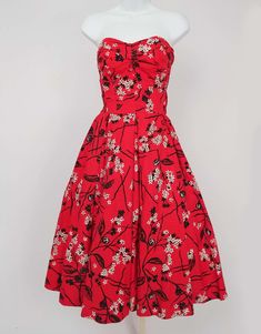 For Sale on 1stDibs - Shaheen Tiki Print Red Dress & Bolero Set, 1950s. Cotton printed tiki set, convertible dress can turn from a halter neck to strapless. Dress pulls on over Vintage Red Dress For Garden Party, 1950s Style Red Lined Dress, 1950s Red Lined Dress, Red 1950s Spring Dresses, 1950s Red Sleeveless Dress, Red Sleeveless 1950s Dress, 1950s Style Red Dress For Vintage Fashion, 1950s Red Vintage Fashion Dress, 1950s Style Red Vintage Fashion Dress