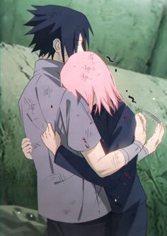 two anime characters hugging each other in front of a green wall with graffiti on it