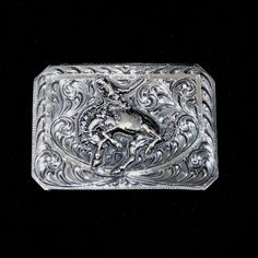 Vogt Silversmiths Trophy Buckles The Centennial Bronc Channel Buckle Elegant Hand Tooled Belt Buckles For Formal Occasions, Elegant Hand Tooled Belt Buckles For Formal Wear, Elegant Formal Hand-tooled Belt Buckles, Classic Concho Belt Buckles For Rodeo, Classic Silver Hand-tooled Belt Buckle, Classic Hand Tooled Silver Belt Buckles, Western Engraved Belt Buckles For Formal Wear, Antique Engraved Belt Buckles For Formal Wear, Engraved Western Belt Buckles For Western-themed Events