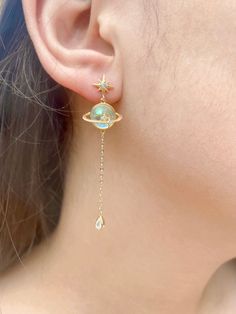 ✔ Planet earrings solar system, dainty and trendy earrings jewelry  *Length: 2.18" *Width: 0.56" *Gold Pated  ♥ T A K E ♥ G O O D ♥ C A R E ♥  Please follow these tips to keep it longer. Keep it in a dry place. Please take it off before bathing, exercising, or swimming. Don't wear it in the pools, the ocean, or in hot tubs. Keep perfume, sunscreen, lotions, hairspray, and other chemicals off your jewelry. Store it in an air-tight container when you don't wear it. * RETURNS AND EXCHANGES TERMS ♥ Space-themed Dangle Jewelry Gift, Gold Space-themed Earrings Gift, Space-themed Gold Earrings Gift, Space-themed Drop Earrings As Gift, Solar System Jewelry, Saturn Earrings, Saturn Planet, Planet Earrings, Moon And Star Earrings