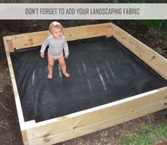 a baby sitting in a wooden bed frame with the words don't forget to add your landscaping fabric