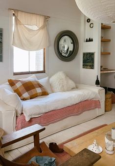 a living room filled with furniture and decor