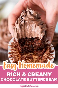 a hand holding a chocolate cupcake with frosting on it and the words easy homemade rich & creamy chocolate buttercream