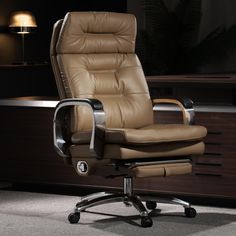 an office chair sitting in front of a desk